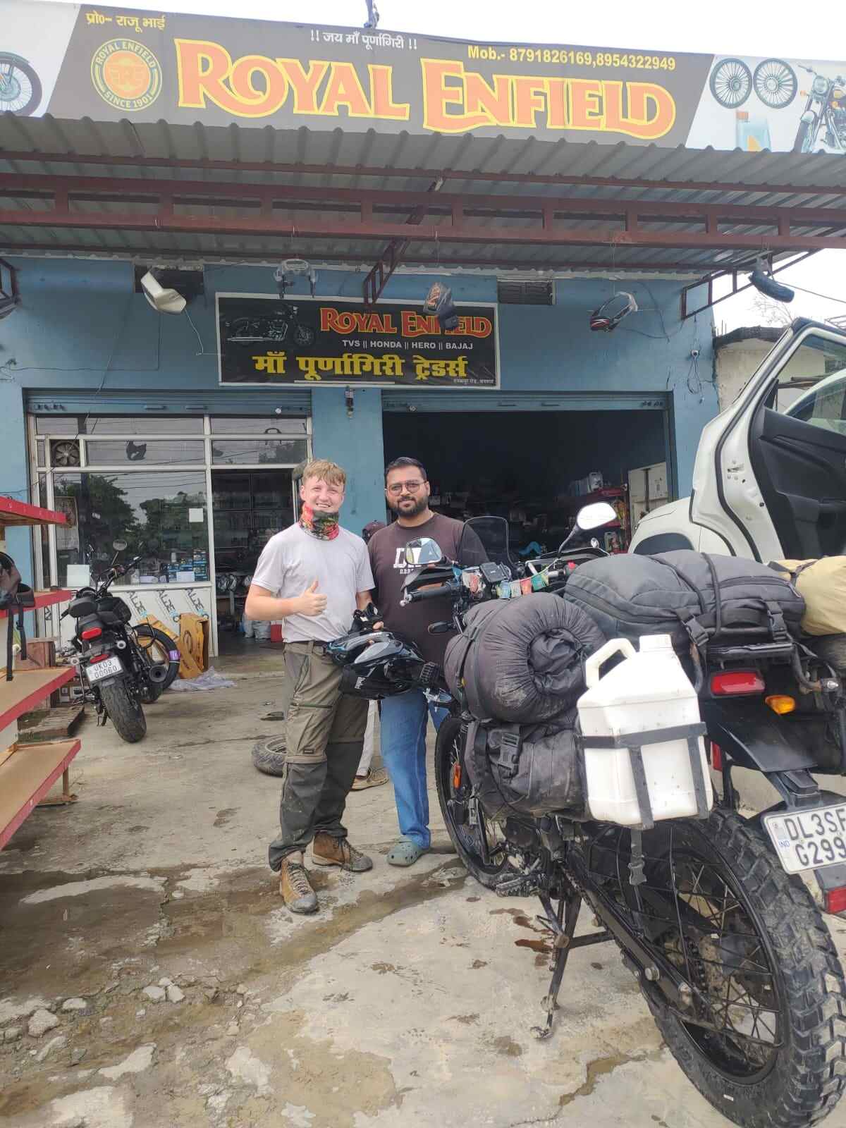 Maa Purnagiri Auto Service shop banner in Banbasa
